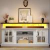 imageYITAHOME Farmhouse TV Stands for 75 Inch TV with Power Outlets Entertainment Center with Sliding Barn Doors and Adjustable Shelves TV Cabinet Media Console Table for Living Room Dark Rustic OakWhiteBlack