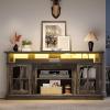 imageYITAHOME Farmhouse TV Stands for 75 Inch TV with Power Outlets Entertainment Center with Sliding Barn Doors and Adjustable Shelves TV Cabinet Media Console Table for Living Room Dark Rustic OakDark Rustic Oak