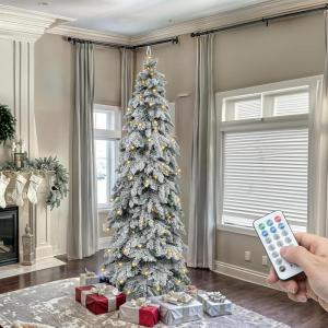 imageYITAHOME PreLit Mountain Pine Flocked Christmas Tree with Remote 75FT PreDecorated Hierarchical Tower Flocked Christmas Tree 1278 Branch Tips 550 Lights 55 Pine Cones for Party Home DecoWhite