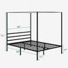 image:imageYITAHOME Metal Four Poster Canopy Bed Frame  14 Inch Platform Bed with Builtin Headboard Strong Metal Slat Mattress Support No Box Spring Needed Black King SizeCanopy Bed